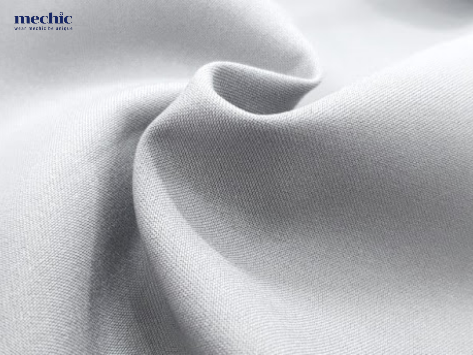 Blouse nữ dáng ngắn 05 với vải Nano Poly co giãn 4 chiều – đỉnh cao công nghệ cho sự linh hoạt, thoáng mát và chuyên nghiệp trong môi trường y tế